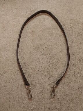 Dark brown horsebit bag strap